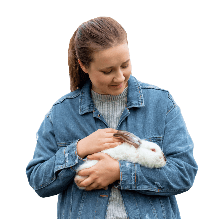 high-angle-woman-caring-rabbit